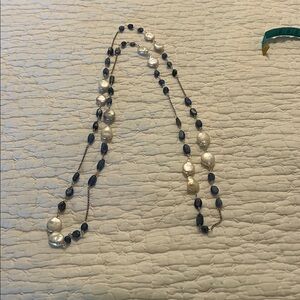Elegant Blue and White Beaded Necklace on a silver chain. 22 inches